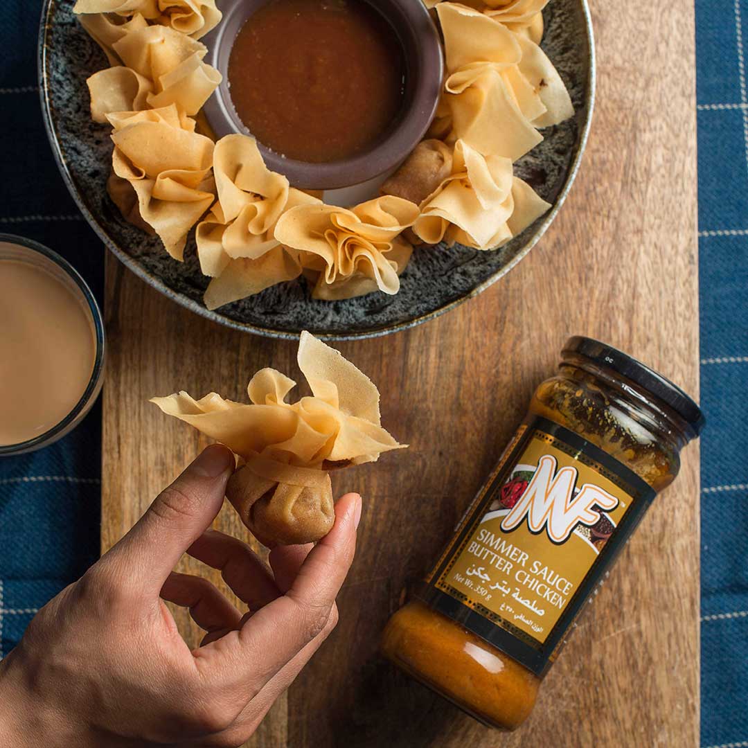 Wontons Butter Chicken Served with Tamarind Chutney Dipping